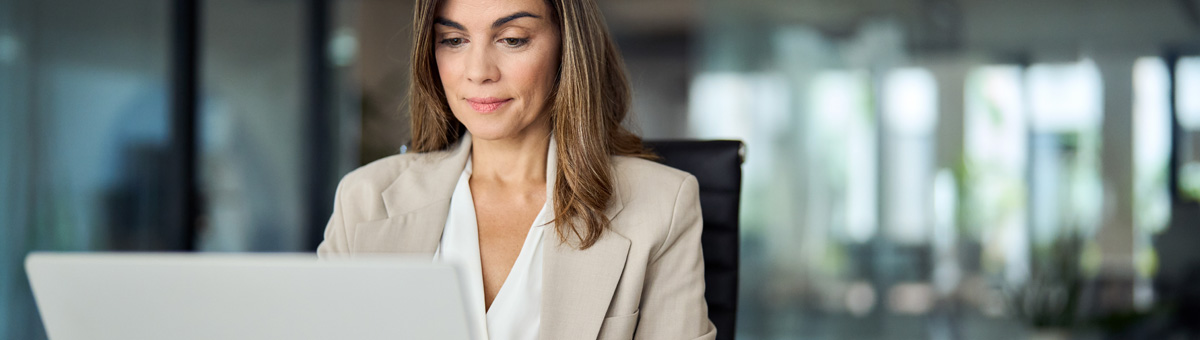 Woman at laptop in the office